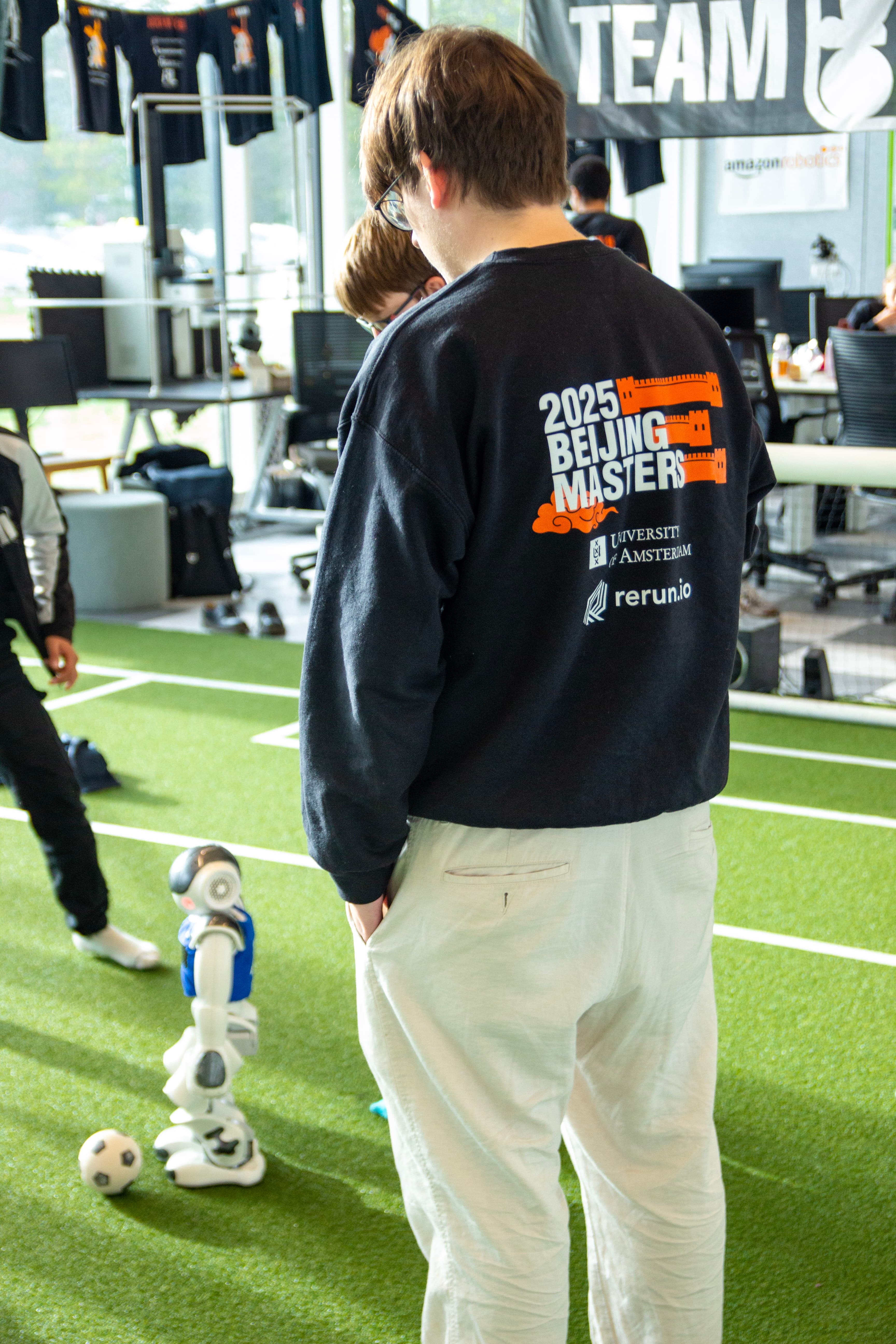 The team looking on as the robot walks around